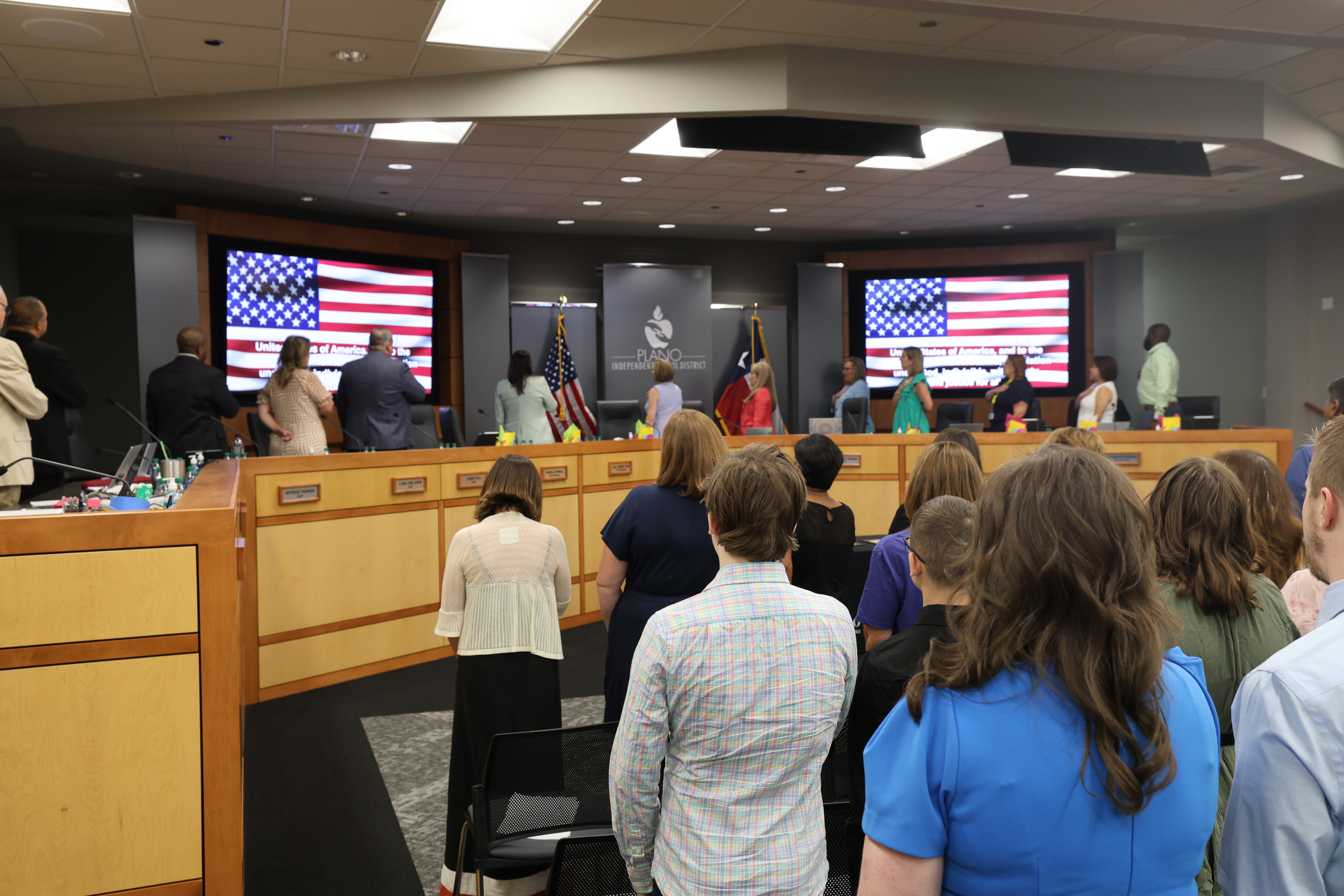 Board of Trustees leading in the pledge of allegiance